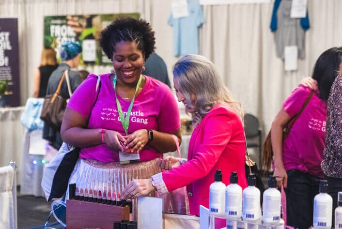 Summit attendees take a moment to connect with exhibiting companies and partner organizations in the YSC Summit Exhibitor Hall